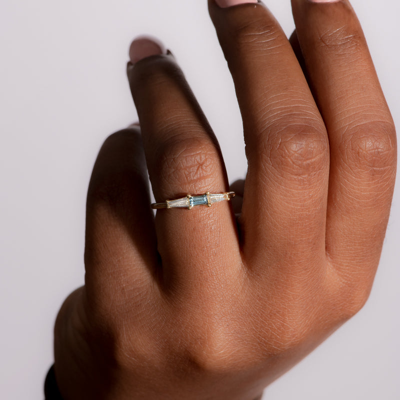 Minimalist-Diamond-and-Teal-Sapphire-Ring-Sapphire-Wedding-Ring-moment