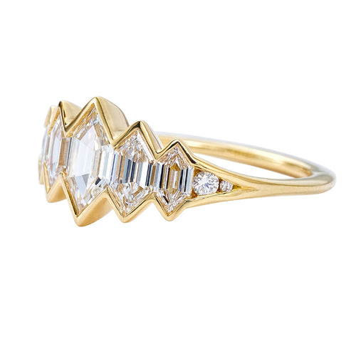 Mountain-Lake-Engagement-Ring-with-Hexagon-Cut-Diamonds-and-a-Golden-Bezel-side-closeup
