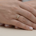 Nesting-Wedding-Ring-with-Baguette-Diamonds-S-set-on-finger