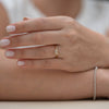 Nesting-Wedding-Ring-with-Baguette-Diamonds-S-set-on-finger