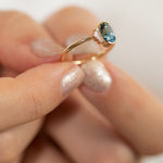 OOAK-Oval-Cut-Teal-Sapphire-Engagement-Ring-with-White-Diamond-Wings-side-shot