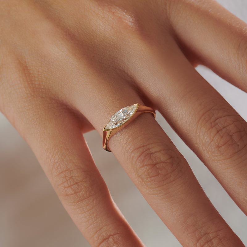 OOAK-Stream-Long-Marquise-Diamond-_-Gold-Engagement-Ring-SIDE-SHO-on-finger