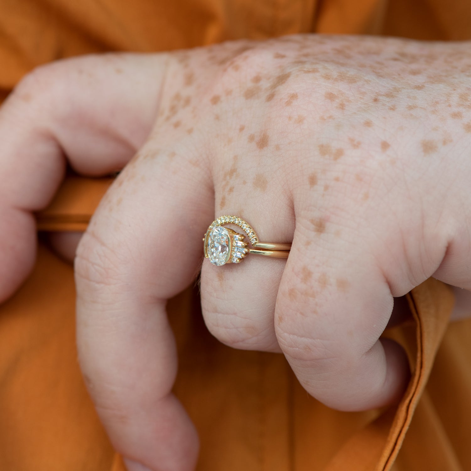 Oval diamond ring with baguettes Clearance