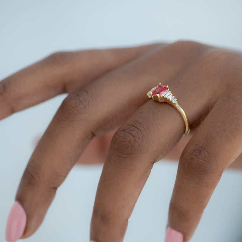 Padparadscha-Sapphire-Engagement-Ring-with-Baguette-Diamond-Detailing-side-shot