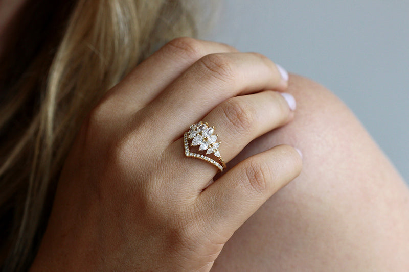 Pear Diamond Cluster Ring In A Set On Finger