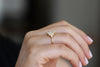 Pear Diamond Cluster Ring On Ring Finger