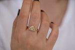 Pear Shaped Diamond Ring on Hand Top Down View 