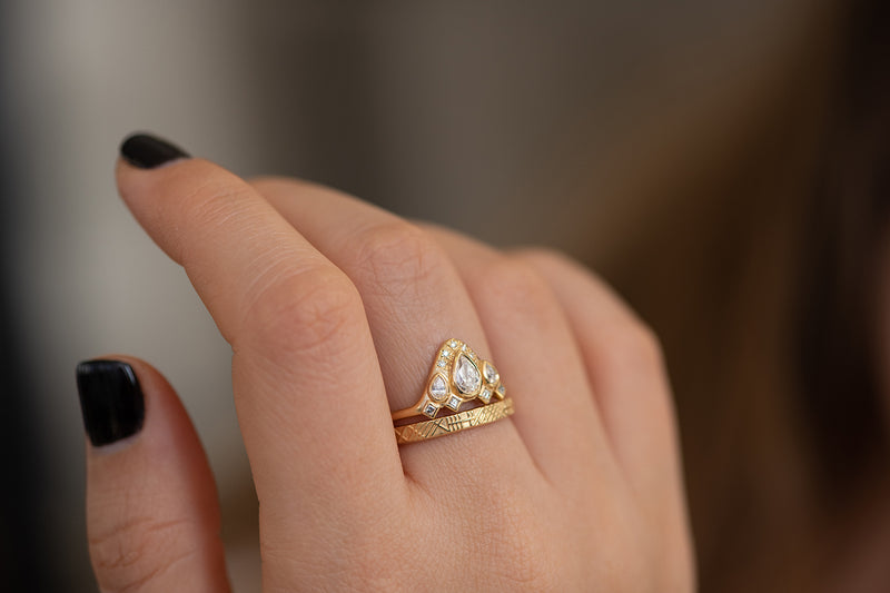 Pear Shaped Diamond Ring on Hand Side View 