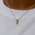 Pearl-and-Diamond-Necklace-in-Solid-Gold-on-shirt