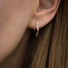 Pentagon-Shaped-Hoop-Earrings-with-Baguette-Diamonds-moment