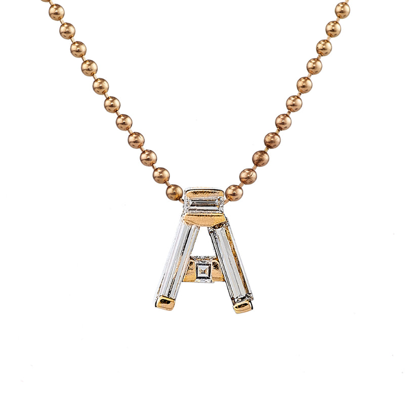 Personalised-Initial-Necklace-with-Baguette-Diamonds-freckles-closeup