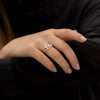 Piercing-Engagement-Ring-with-Grommets-and-a-Grey-Diamond-Halo-angle