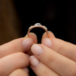 Piercing-Engagement-Ring-with-Grommets-and-a-Grey-Diamond-Halo-side-shot