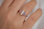 Purple and Lilac Sapphire Ring with Baguette Diamond Up Close on Hand