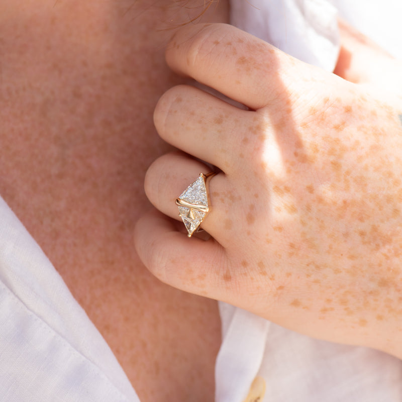 Pyramid-Engagement-Ring-with-Trillion-and-Trapeze-Cut-Diamonds-freckles