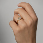 Rhombus-Engagement-Ring-with-Mixed-Diamond-Cuts-on-finger