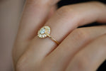 Round Diamond Cluster Engagement Ring Side View on Hand
