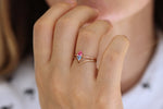 Side View Of Trillion Aquamarine And Pink Spinel Ring In A Set