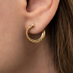 Small-Hoop-Earrings-with-Triangle-chevron-Pattern-in-Enamel-closeup-diamond