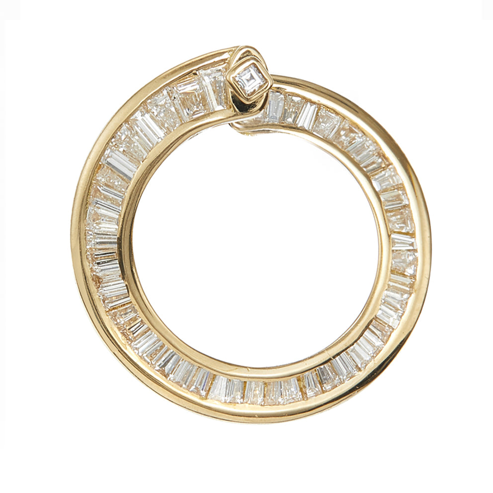 Spiral-Hoop-Earrings-with-Tapered-Baguette-Diamonds-closeup