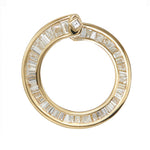 Spiral-Hoop-Earrings-with-Tapered-Baguette-Diamonds-closeup
