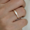 Tapered Baguette Engagement Ring on Hand Up Close Shot