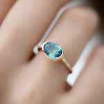Teal-Sapphire-Engagement-Ring-with-Delicate-Diamond-Detailing-OOAK-side-shot