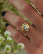Teal-Sapphire-Pagoda-Engagement-Ring-with-Brilliant-Diamonds-ON-FINGER