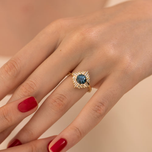 Teal-Sapphire-_Oasis_-Engagement-ring-with-Geometric-Baguette-Diamonds-ON-FINGER