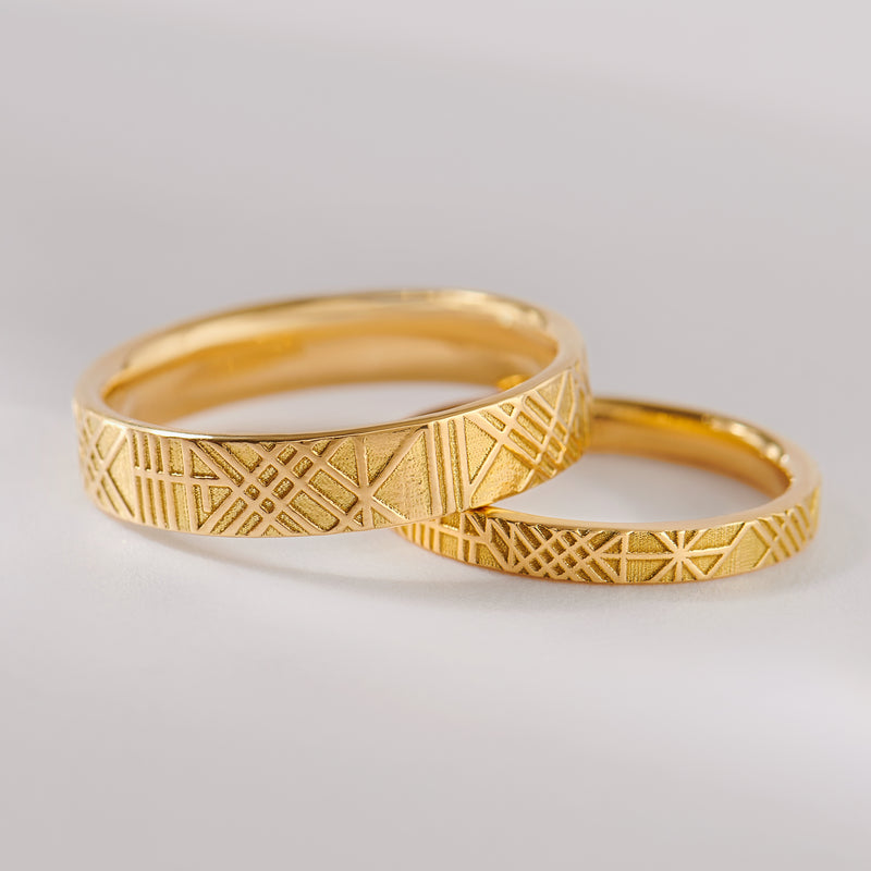 The-Unique-and-Geometric-Couple-A-Set-of-Golden-Wedding-Bands-closeup