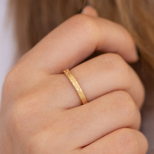 The-Unique-and-Geometric-Couple-A-Set-of-Golden-Wedding-Bands-sparking