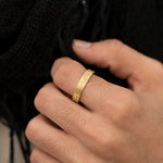 The-Unique-and-Geometric-Couple-A-Set-of-Golden-Wedding-Bands-top-shot
