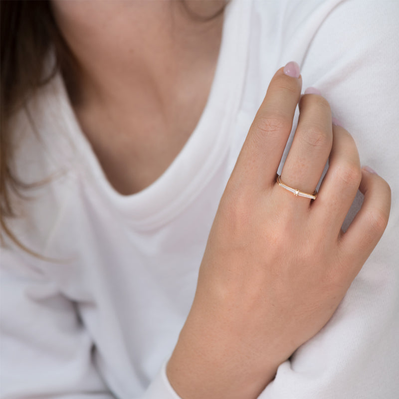 Thin-Tapered-Baguette-Cluster-Ring-Alternative-Wedding-Ring-on-finger