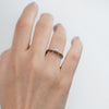 Three-Stone-Engagement-Ring-with-Half-Moon-and-Baguette-Cut-Diamonds-in-set-on-finger