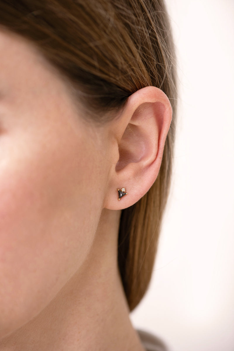 Triangle Earrings with Black and White Diamonds side angle on ear 