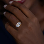 Two-Pepper-Engagement-Ring-with-a-Cluster-of-Brilliant-Cut-Diamonds-OOAK-on-finger