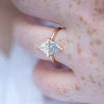Two-Tone-Diamond-Rhombus-Engagement-Ring-White-and-Grey-Trillions-side-shot