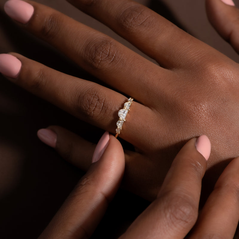 Unique-Half-Moon-Diamond-Engagement-Ring-Five-Diamond-Ring-on-finger