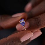 Vintage-Style-Engagement-Ring-with-Trillions-and-Brilliant-Diamonds-closeup-tanzanite-side-shot