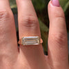 Solitaire Signet Engagement Ring with an Emerald cut Diamond