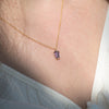 dainty-lilac-sapphire-lantern-pendant-in-solid-gold-on-the-neck