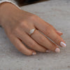 classic Emerald-cut engagement ring with tapered needle baguette diamonds3