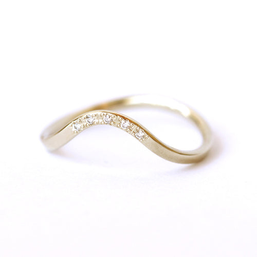 curved wedding ring with diamonds