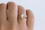 Rhombus diamond ring on hand