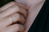 Thin Diamond Wedding Ring on hand